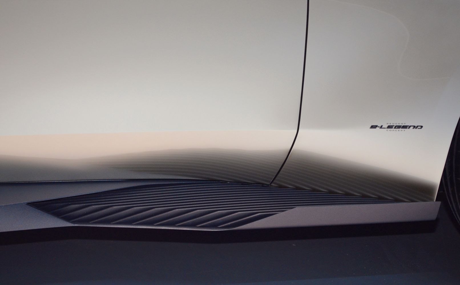 Side door with unique paneling and e-LEGEND Concept badge