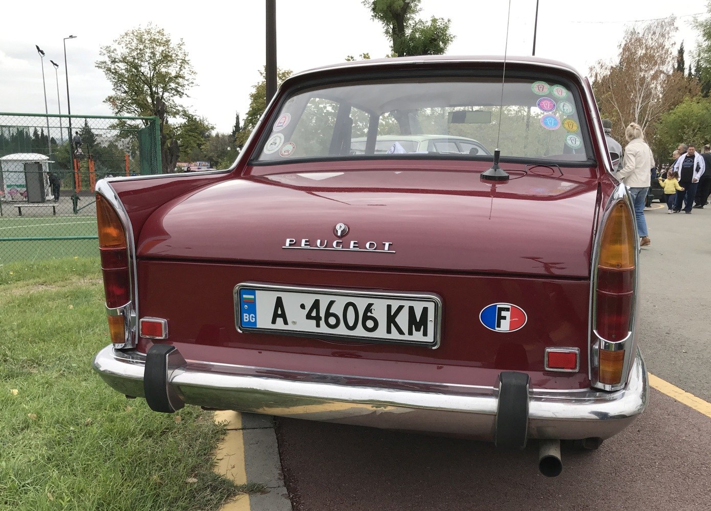 Classic sedan rear with vertical taillights and chrome bumper