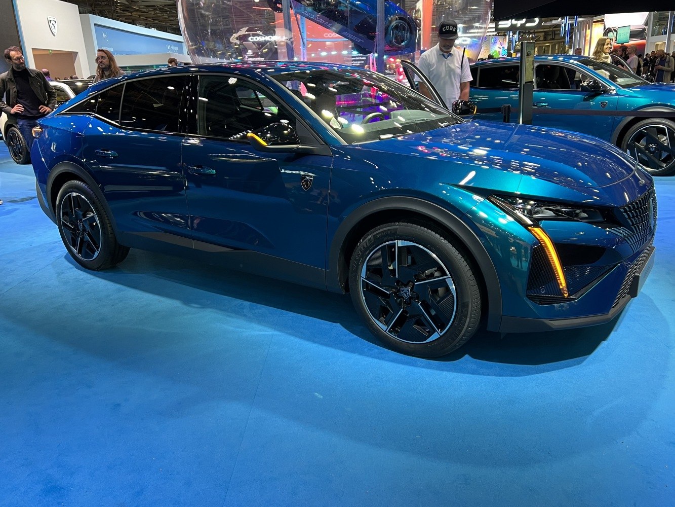 Modern LED front lights and sleek aerodynamic side profile of a crossover SUV.
