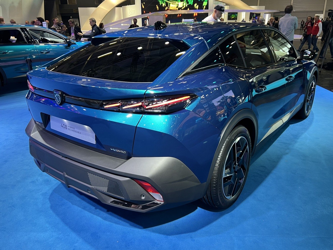 Rear view of crossover with LED tail lights and hybrid badge