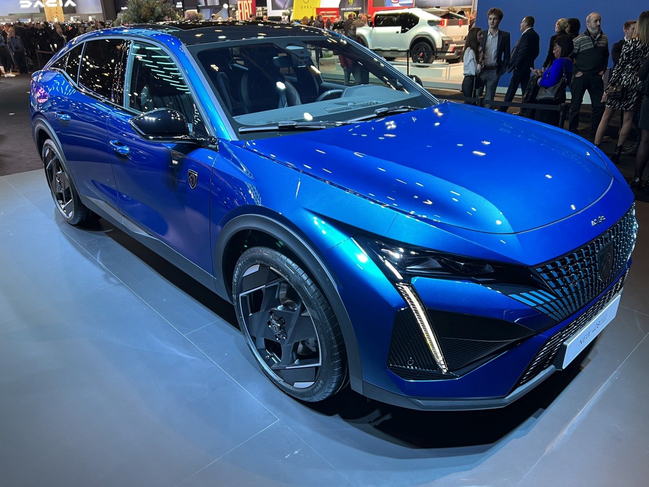 Sleek front design with distinctive LED headlights and unique grille