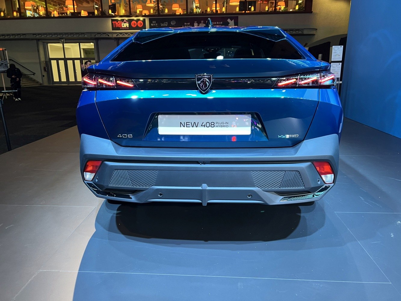 Rear view highlighting hybrid badge and modern LED taillights