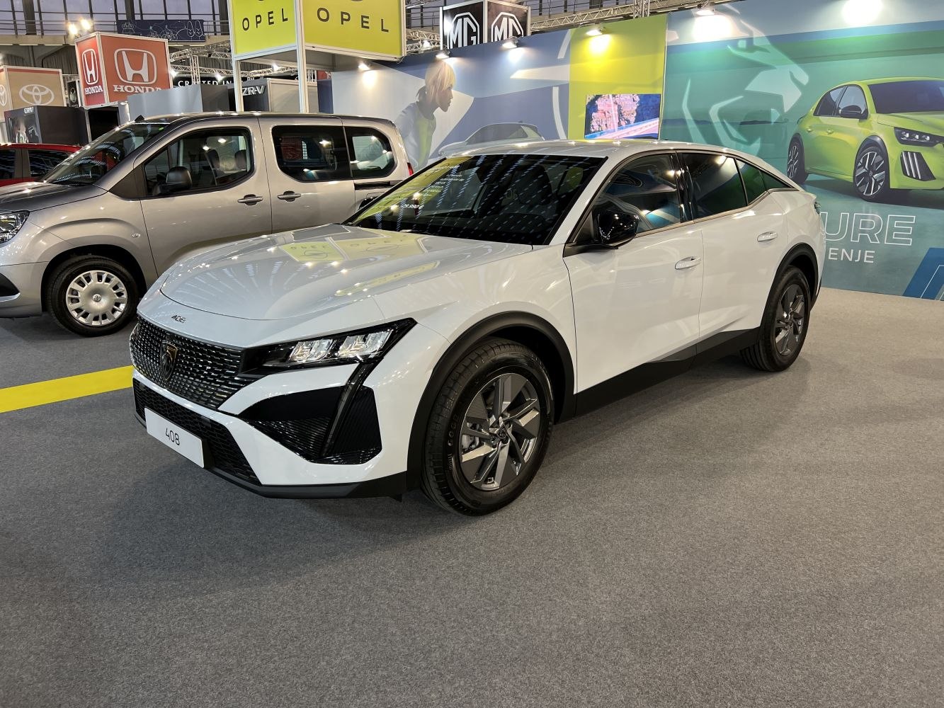 Modern crossover with angular LED headlights and patterned front grille