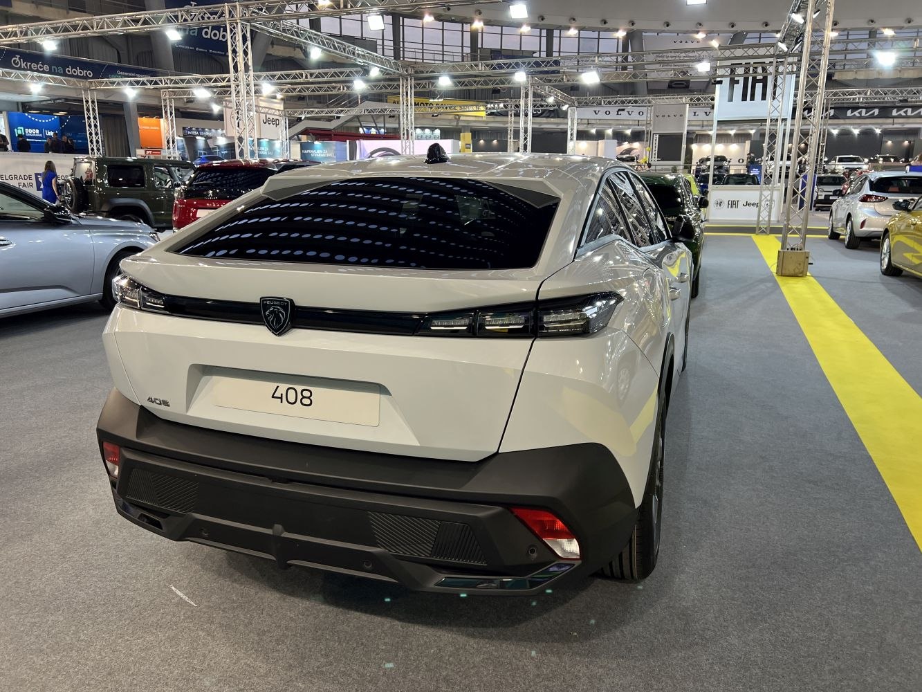 Rear view of a modern crossover with LED tail lights and sporty bumper