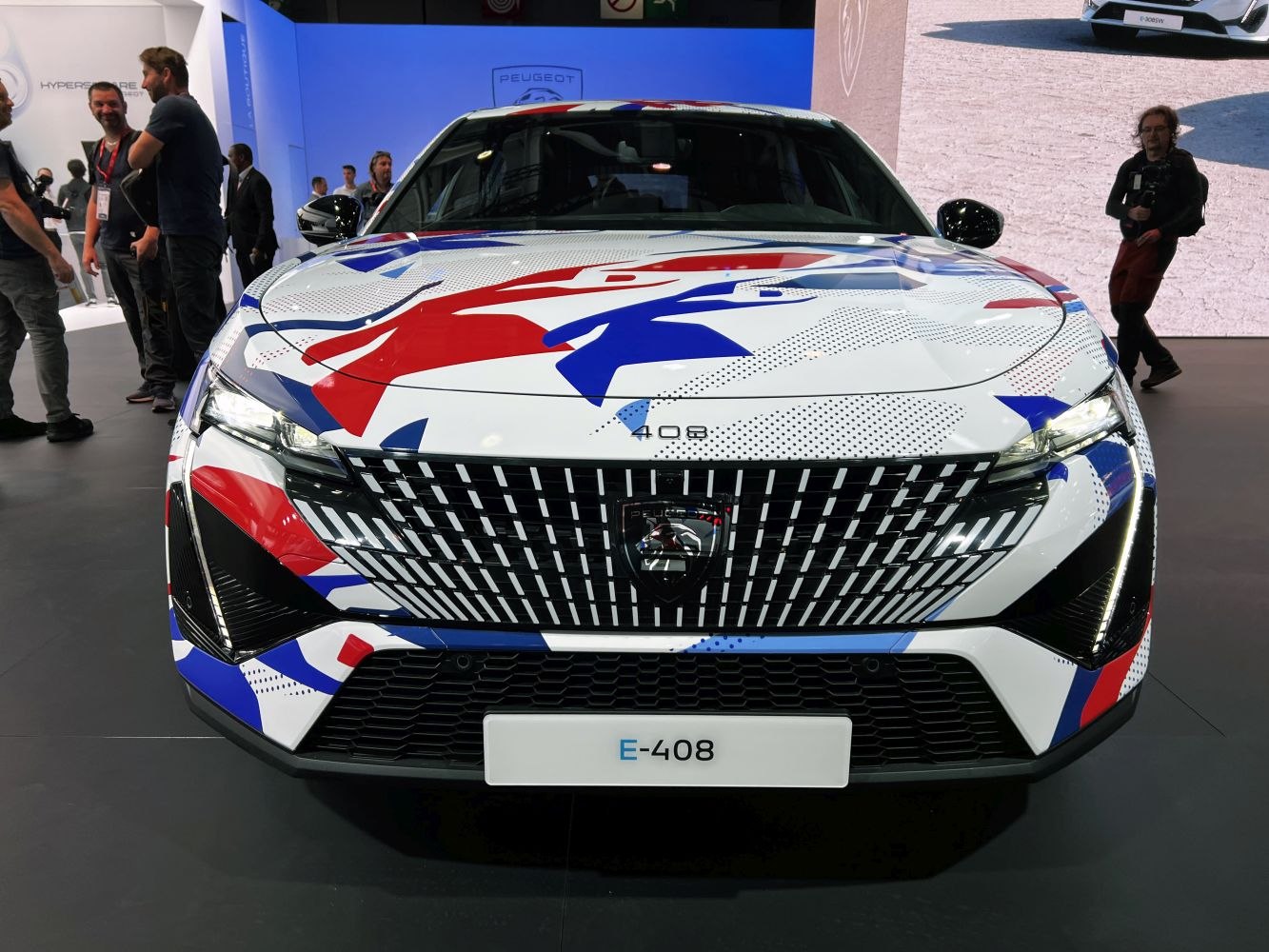 Front grille with vibrant hood graphics and LED headlights