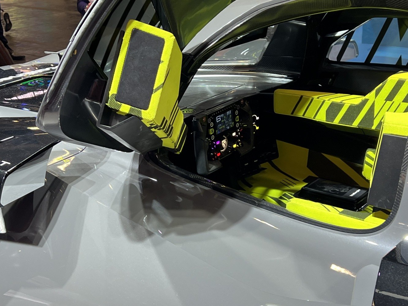 Digital dashboard and innovative racing prototype door with neon yellow seat details