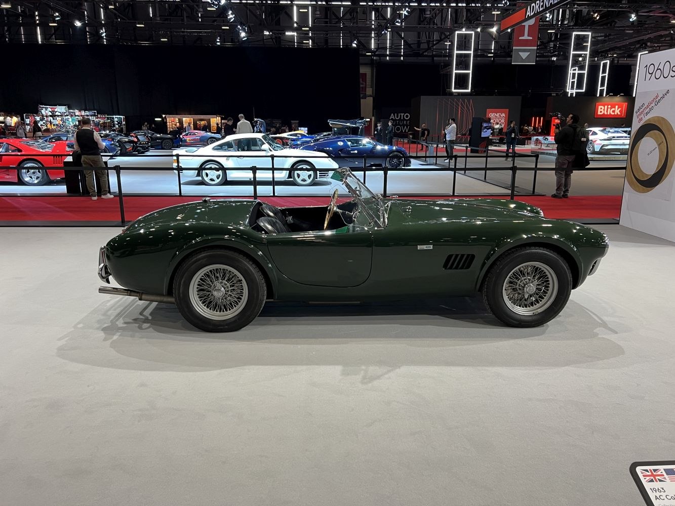 1960s open-top sports car with wire wheels and sleek low profile