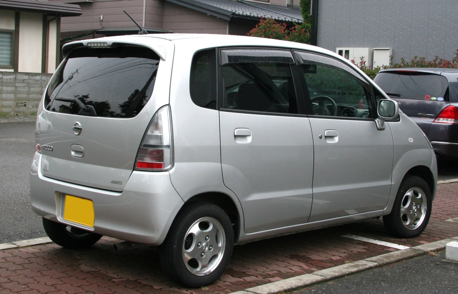 Silver compact 4WD hatchback rear with distinctive tail lights