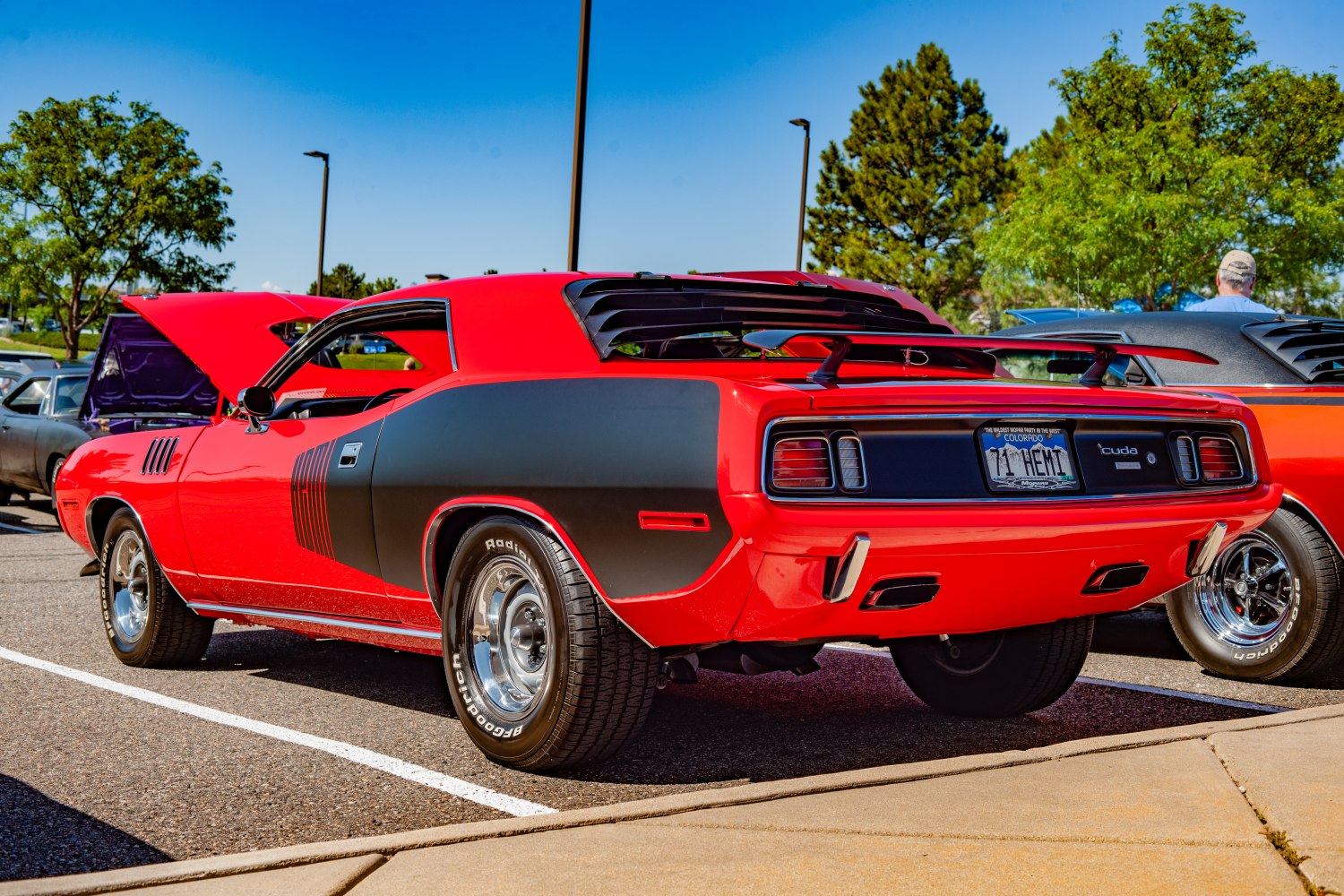 Rear spoiler, rear window louvers, and taillights on classic muscle car