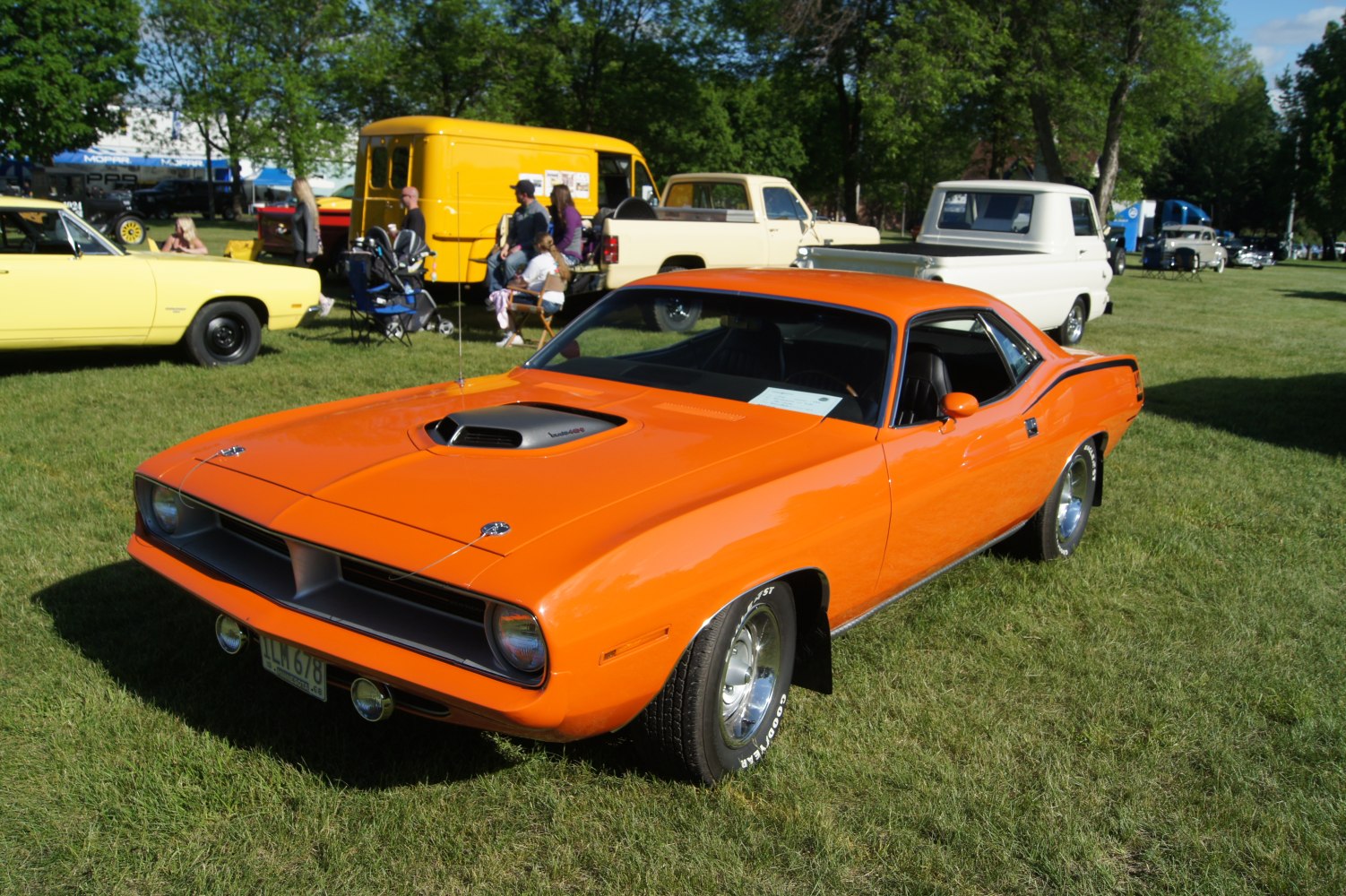 Classic muscle car with hood scoop and rear spoiler