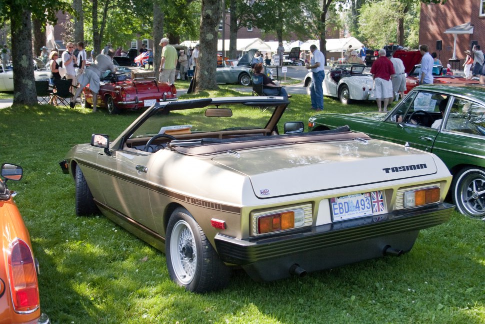 Convertible vintage car rear view with Tasmin badge and distinctive tail lights.
