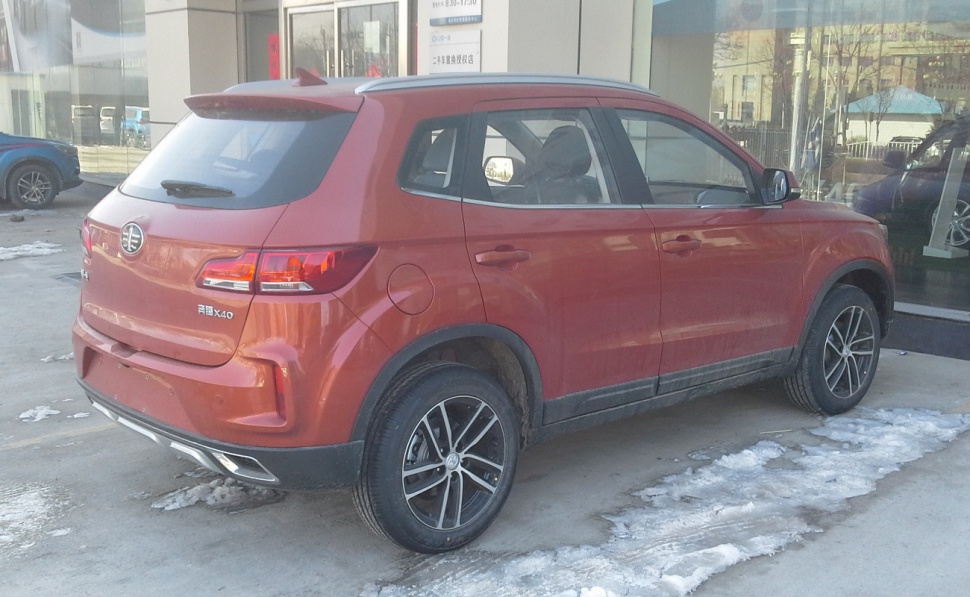 Rear and side view of compact SUV with sporty alloy wheels and distinct taillights