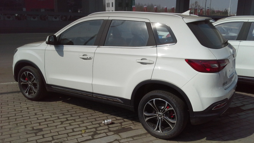 Side profile of compact SUV with alloy wheels and rear design