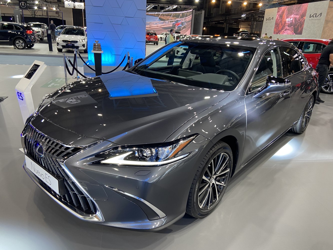 Luxury sedan front view with LED headlights and signature grille.