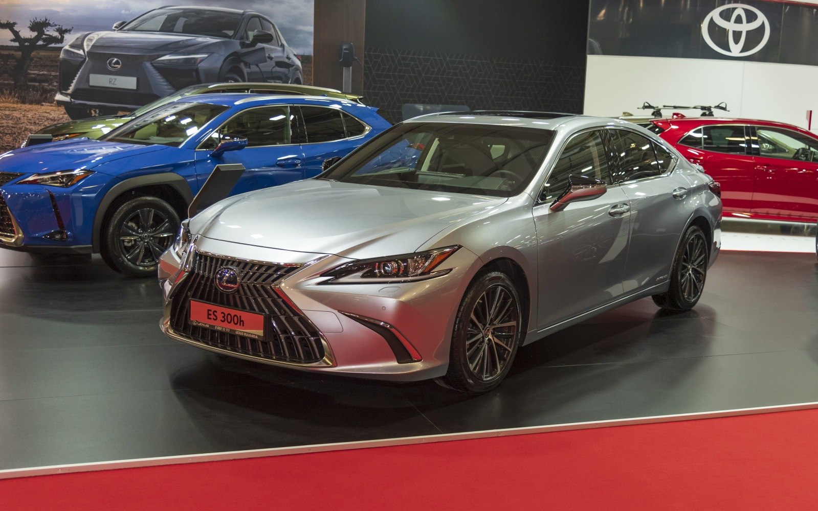 Silver sedan with prominent front grille and sleek headlights