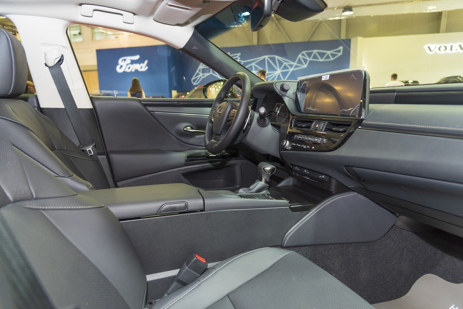 Luxury interior with advanced dashboard and leather seats.
