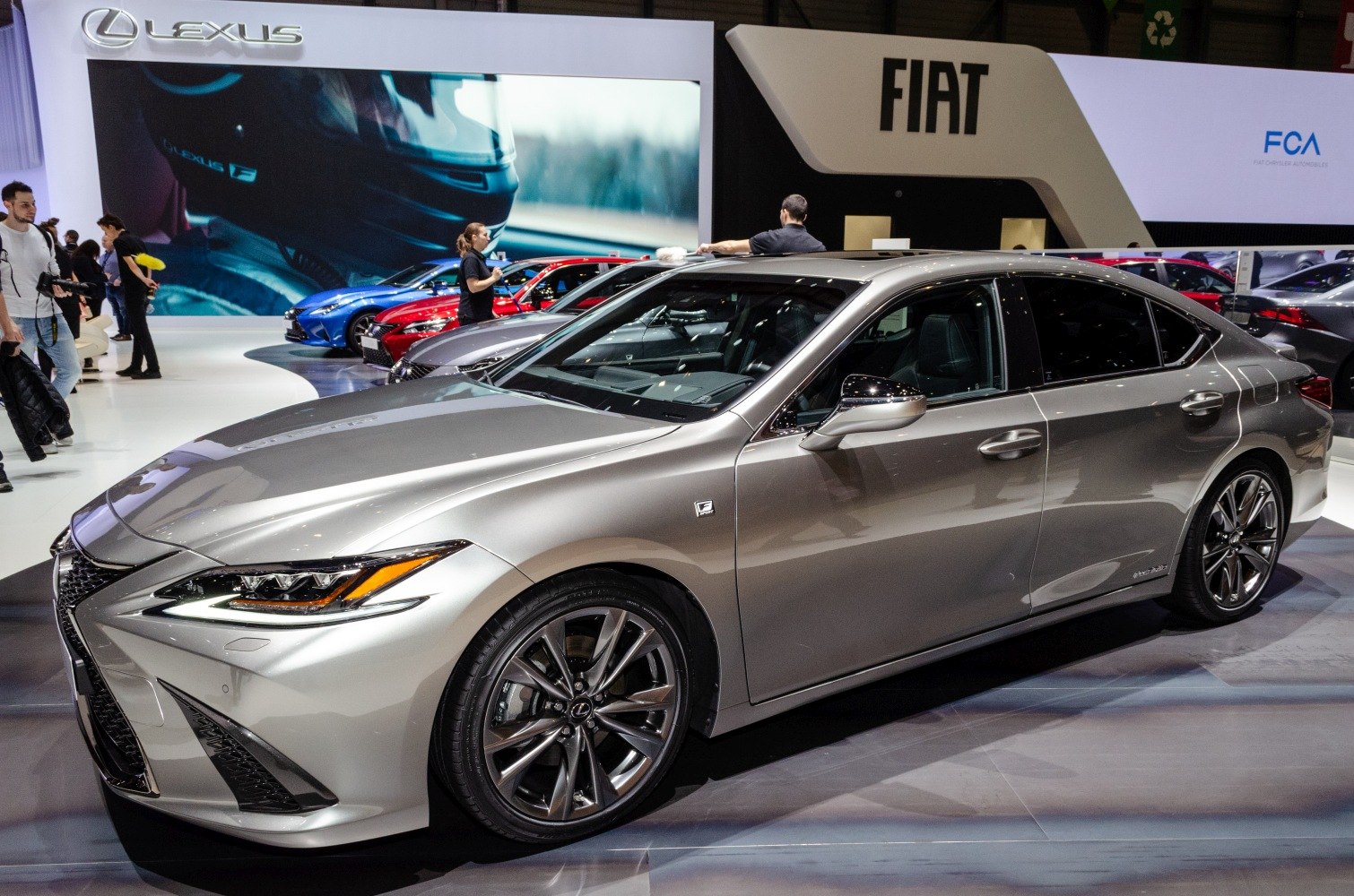 Silver sedan with sharp LED headlights and sporty alloy wheels