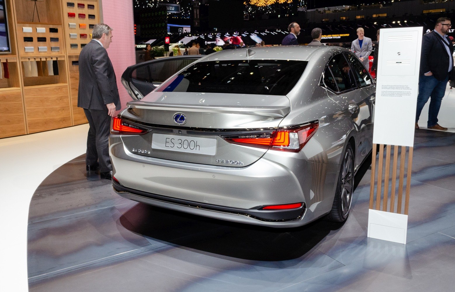 Rear view of a sedan with LED taillights and a rear spoiler
