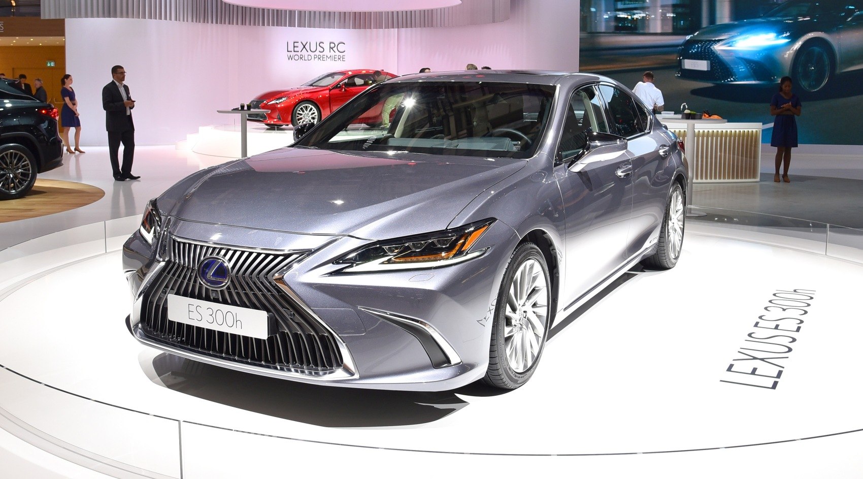 Front view of hybrid luxury sedan with spindle grille and sharp LED headlights