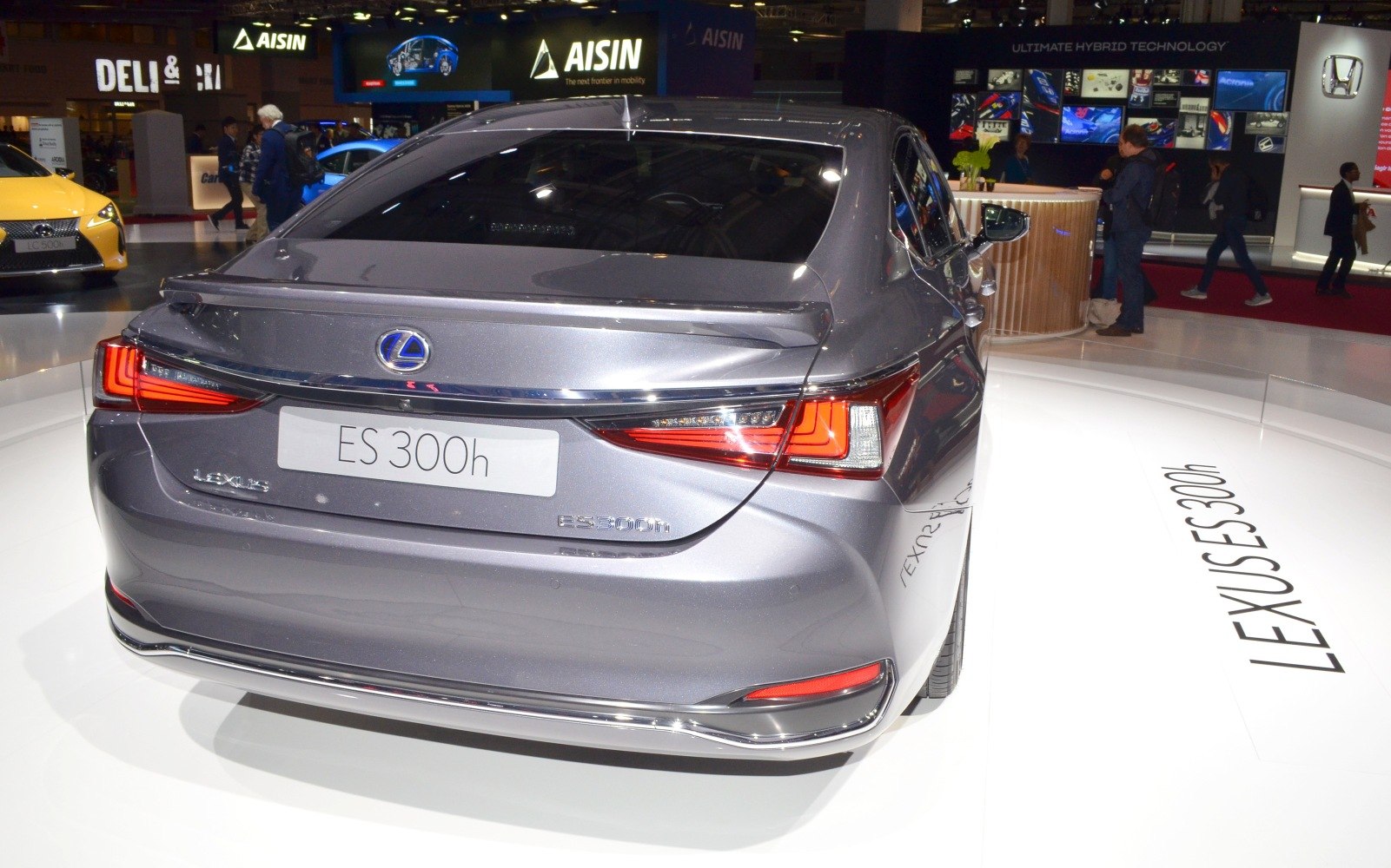 Hybrid sedan rear with LED taillights and trunk spoiler