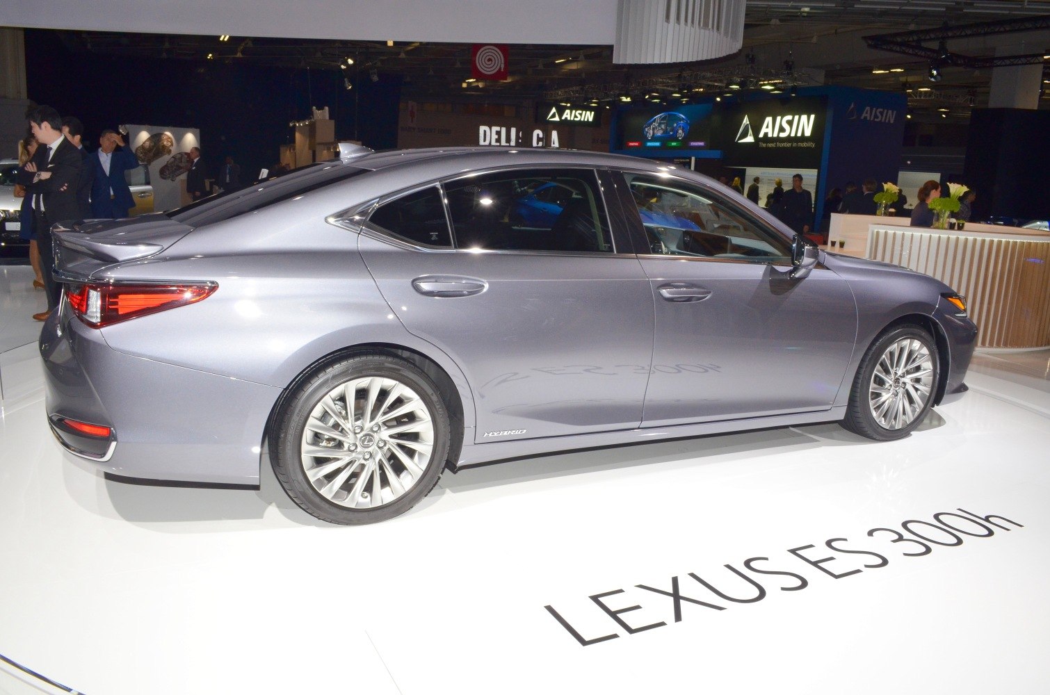 Sleek side profile of a hybrid luxury sedan with distinctive rear styling