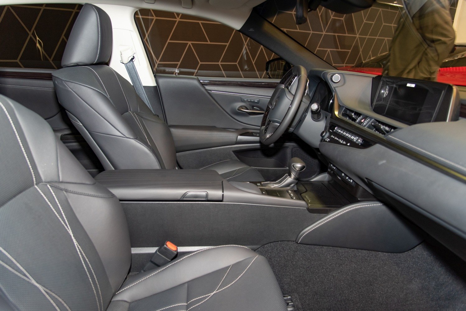 Luxury car interior with leather seats and advanced controls