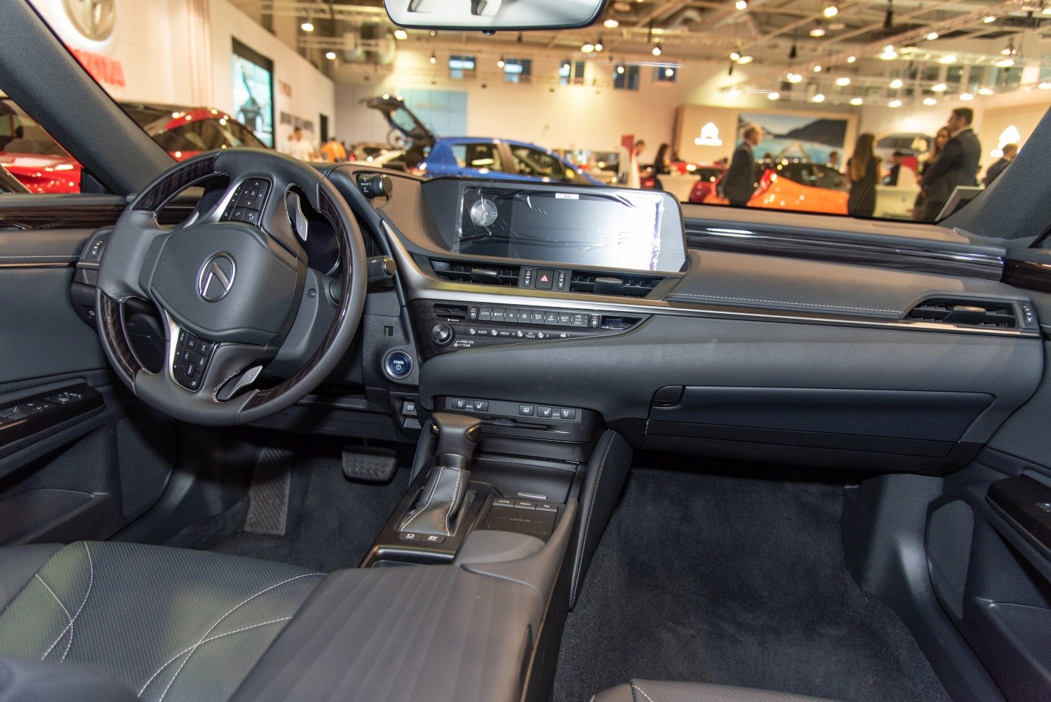 Luxury dashboard and steering wheel with infotainment screen