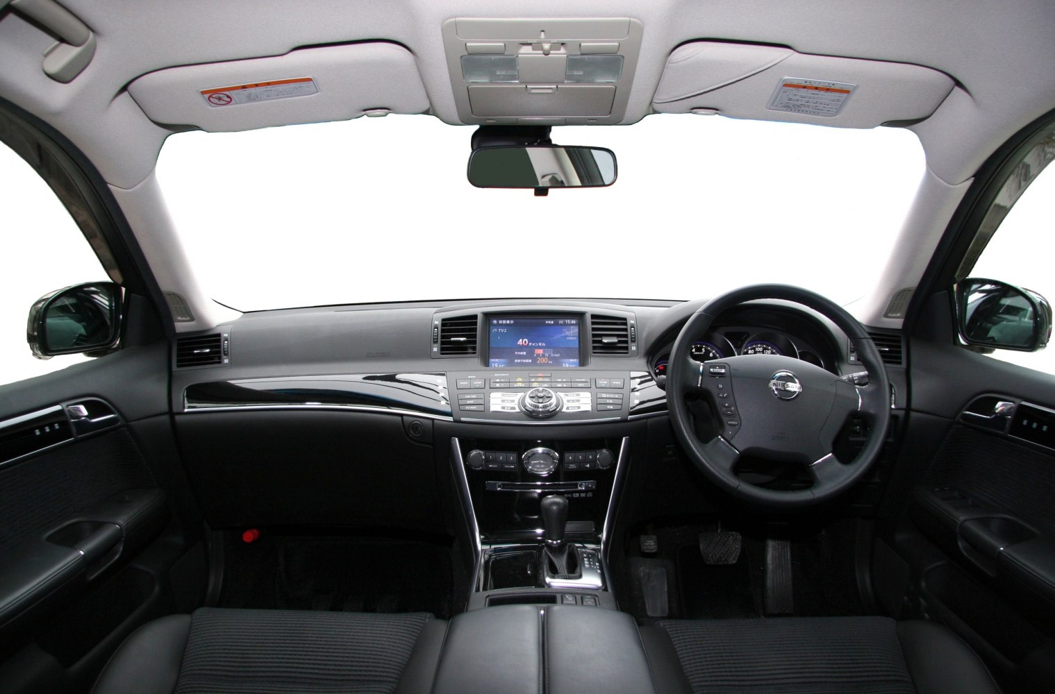 Dashboard and multifunction steering wheel in a luxury sedan interior