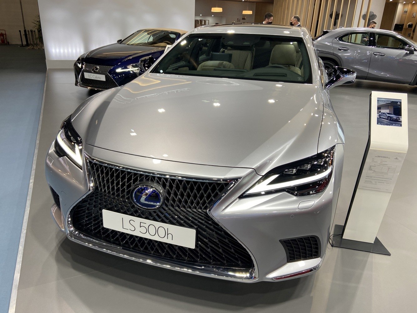 Spindle grille and LED headlights on luxury hybrid sedan front