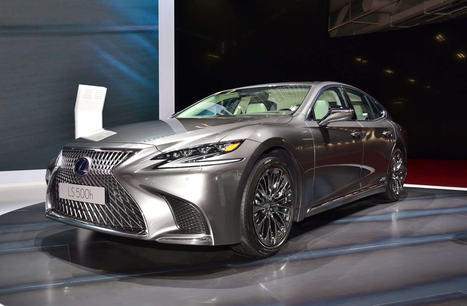 Front grille with intricate mesh and sharp LED headlights