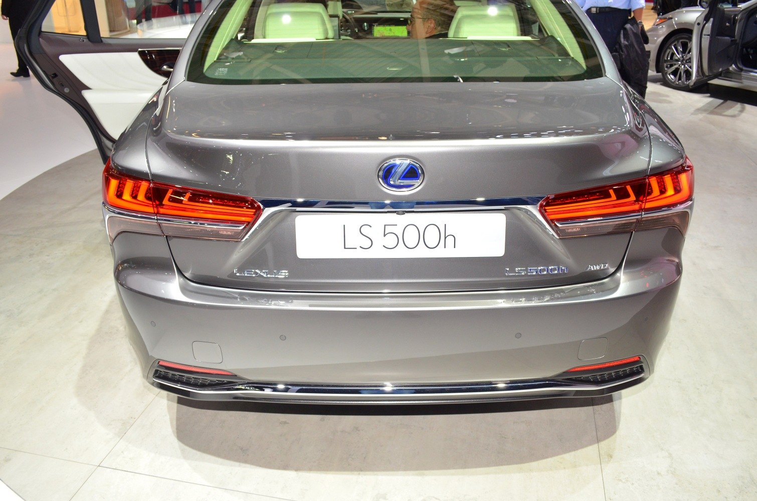 Rear view with LED taillights and LS 500h AWD badge