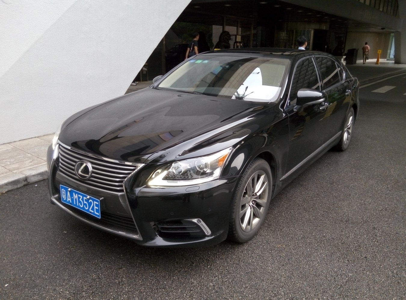 Front grille and LED headlights of a luxury sedan
