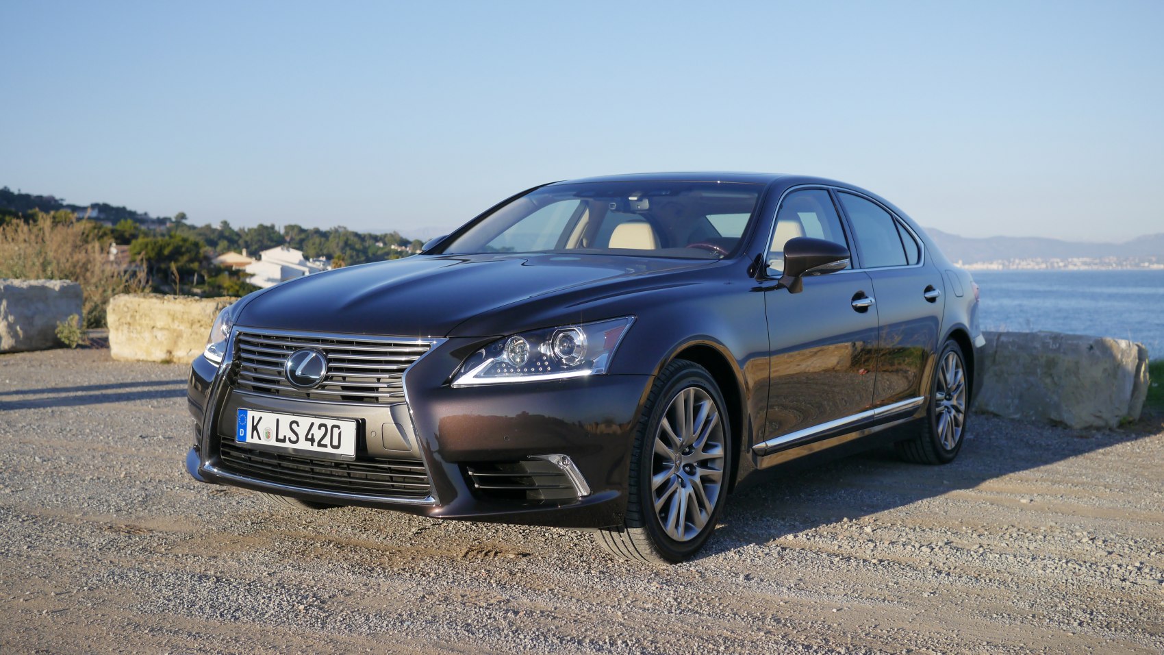 Front three-quarter view showing grille, headlights, and alloy wheels