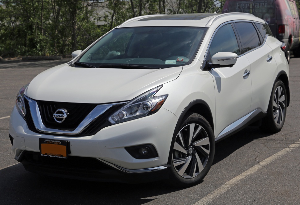 Front view with chrome grille and sharp headlights