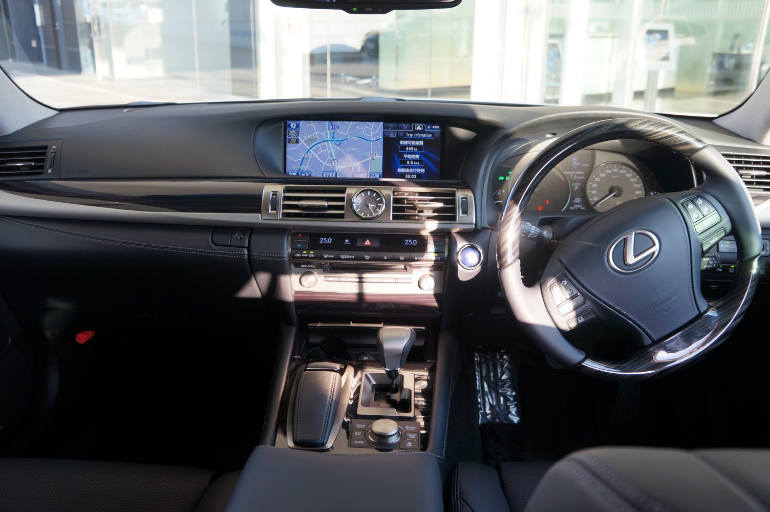 Luxury dashboard with navigation system and analog clock