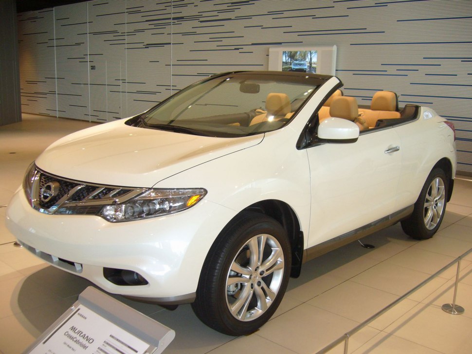 White convertible SUV front and side view with beige leather interior