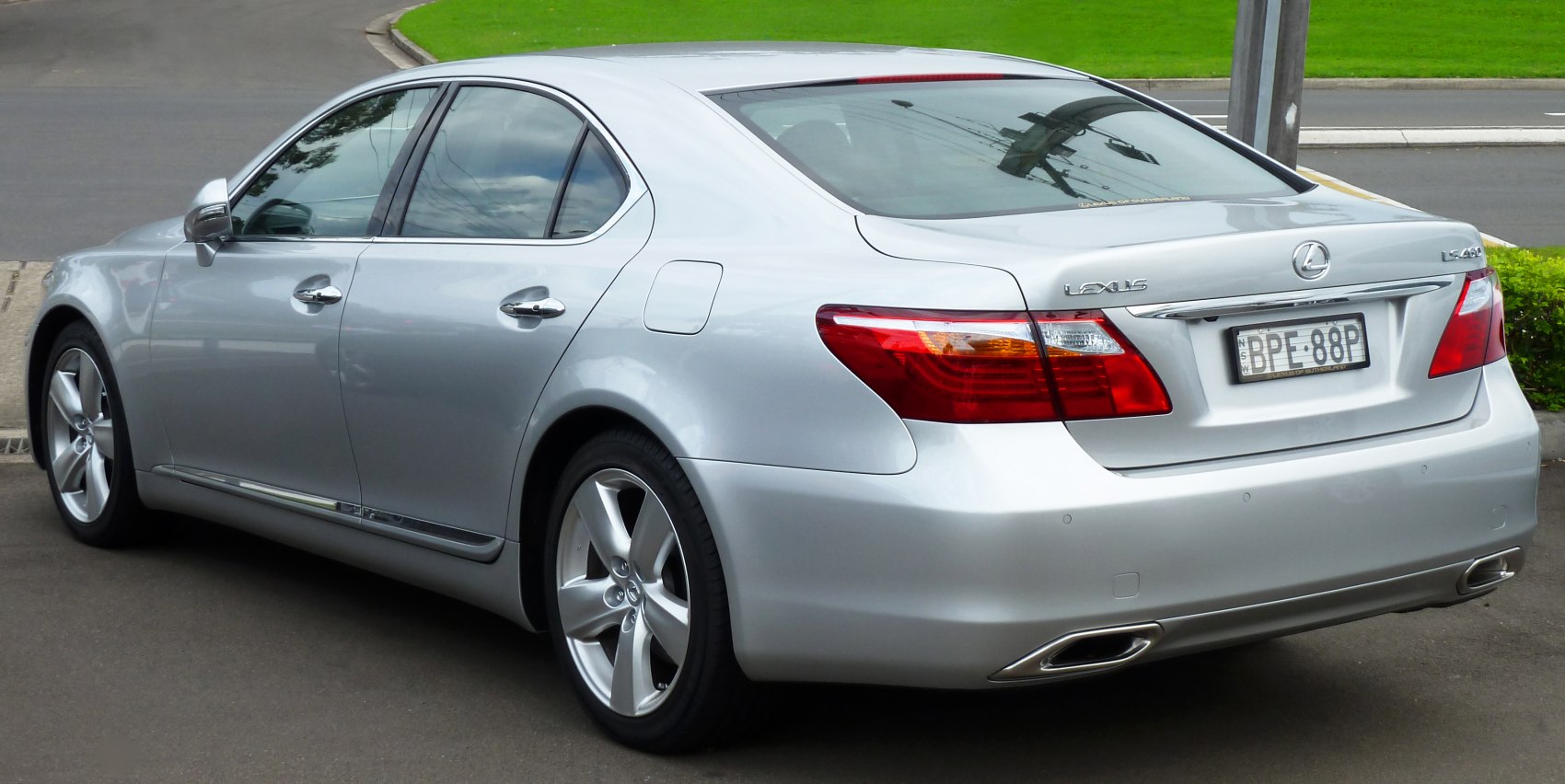 Rear-side view with sleek taillights and dual exhaust tips