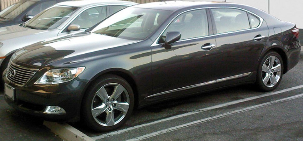 Extended luxury sedan with chrome wheels and sleek profile