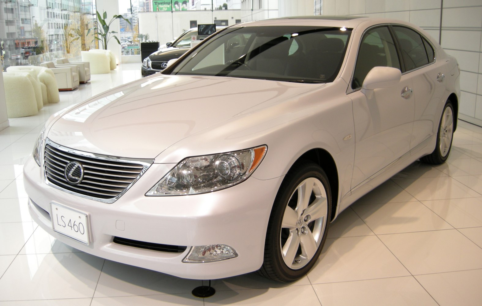 Front three-quarter view showing grille, headlights, and alloy wheels.