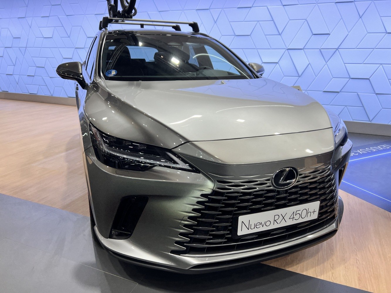 Front grille and LED headlights close-up with roof rack