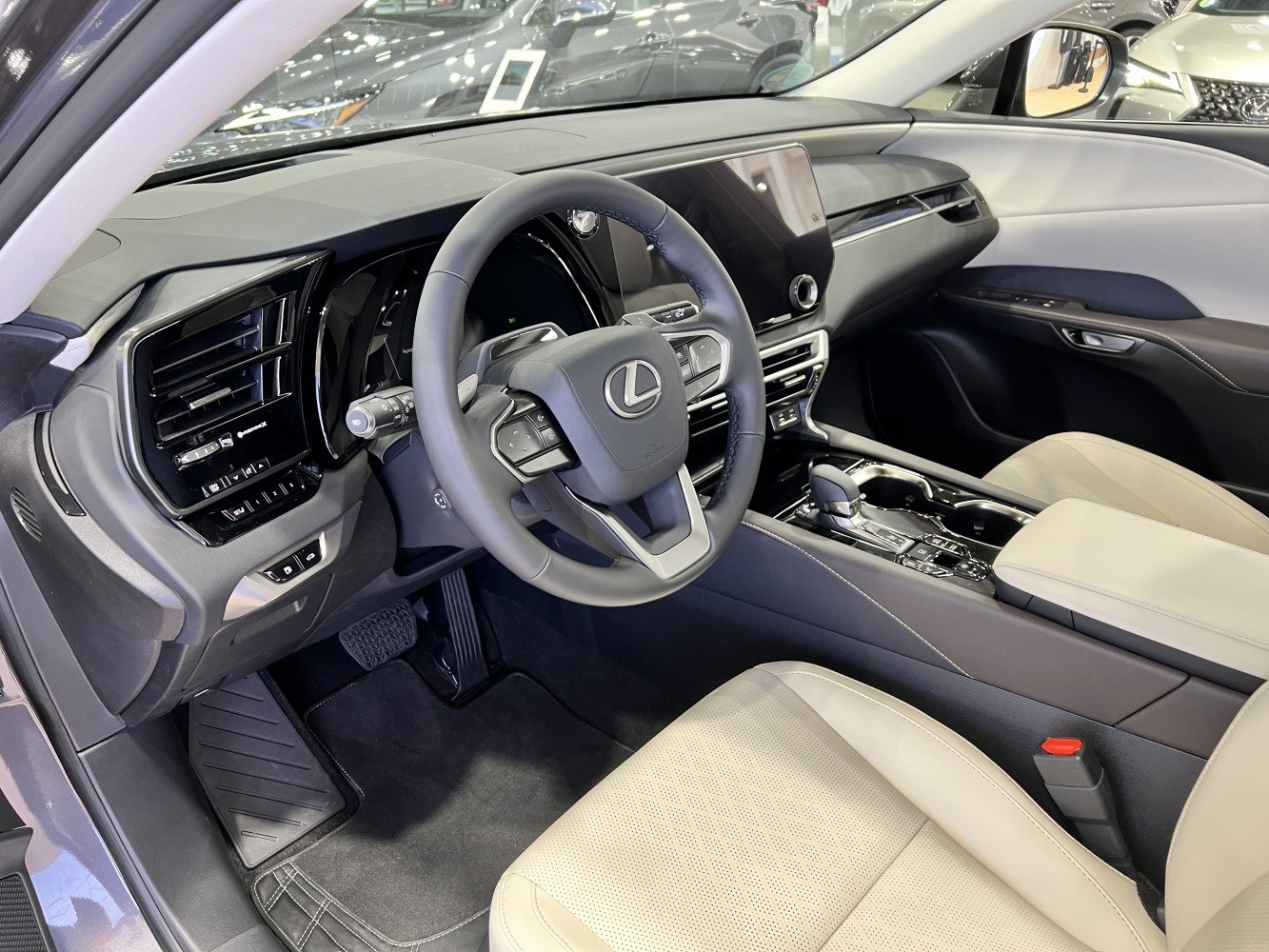 Modern interior dashboard and steering wheel with advanced controls.