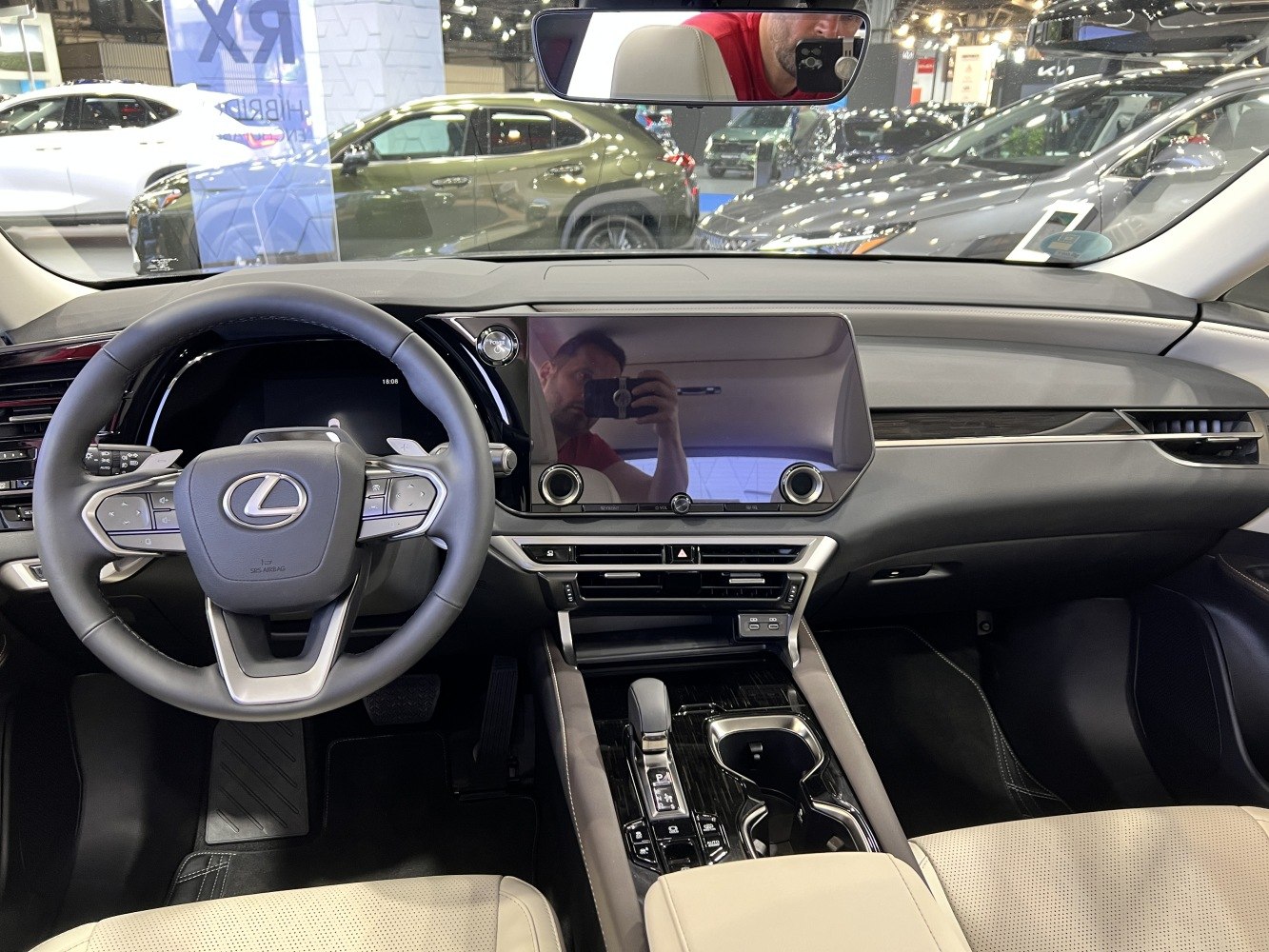 Modern dashboard and steering wheel with touchscreen display and controls