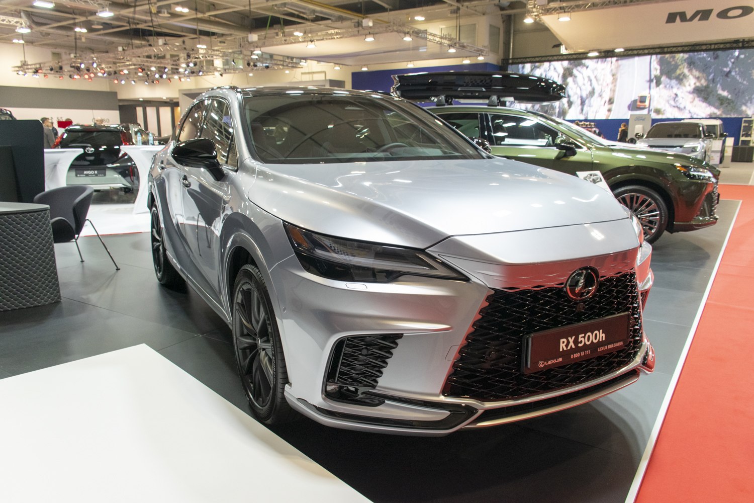 Front view with black spindle grille and sharp headlights