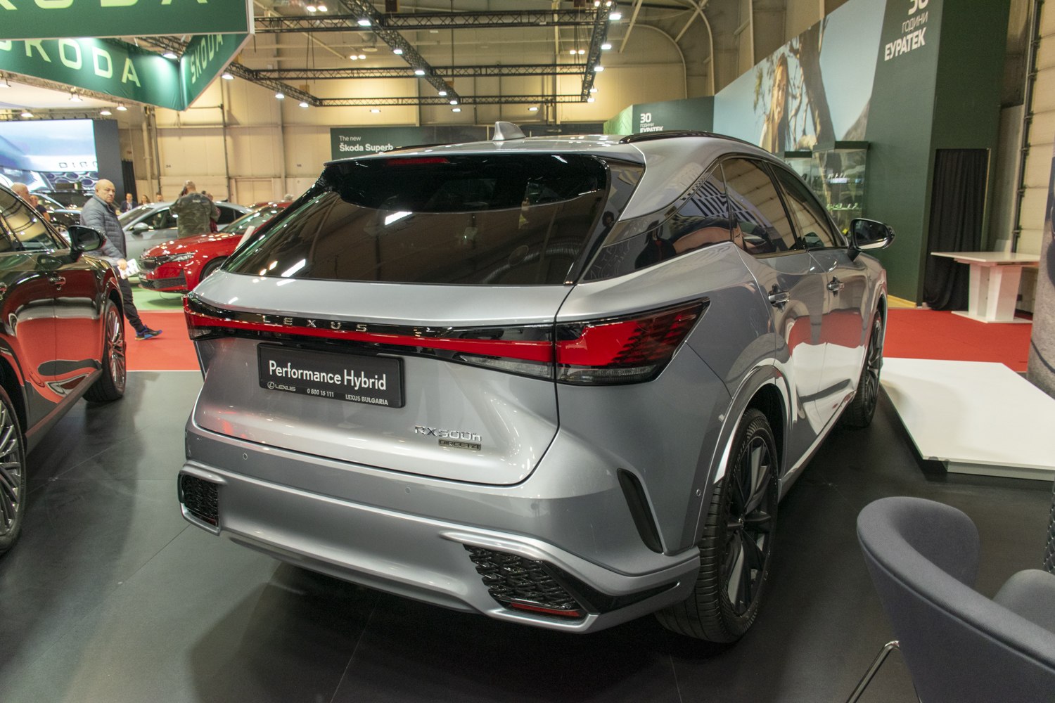 Rear view of a hybrid performance SUV with modern taillight and sporty rear bumper