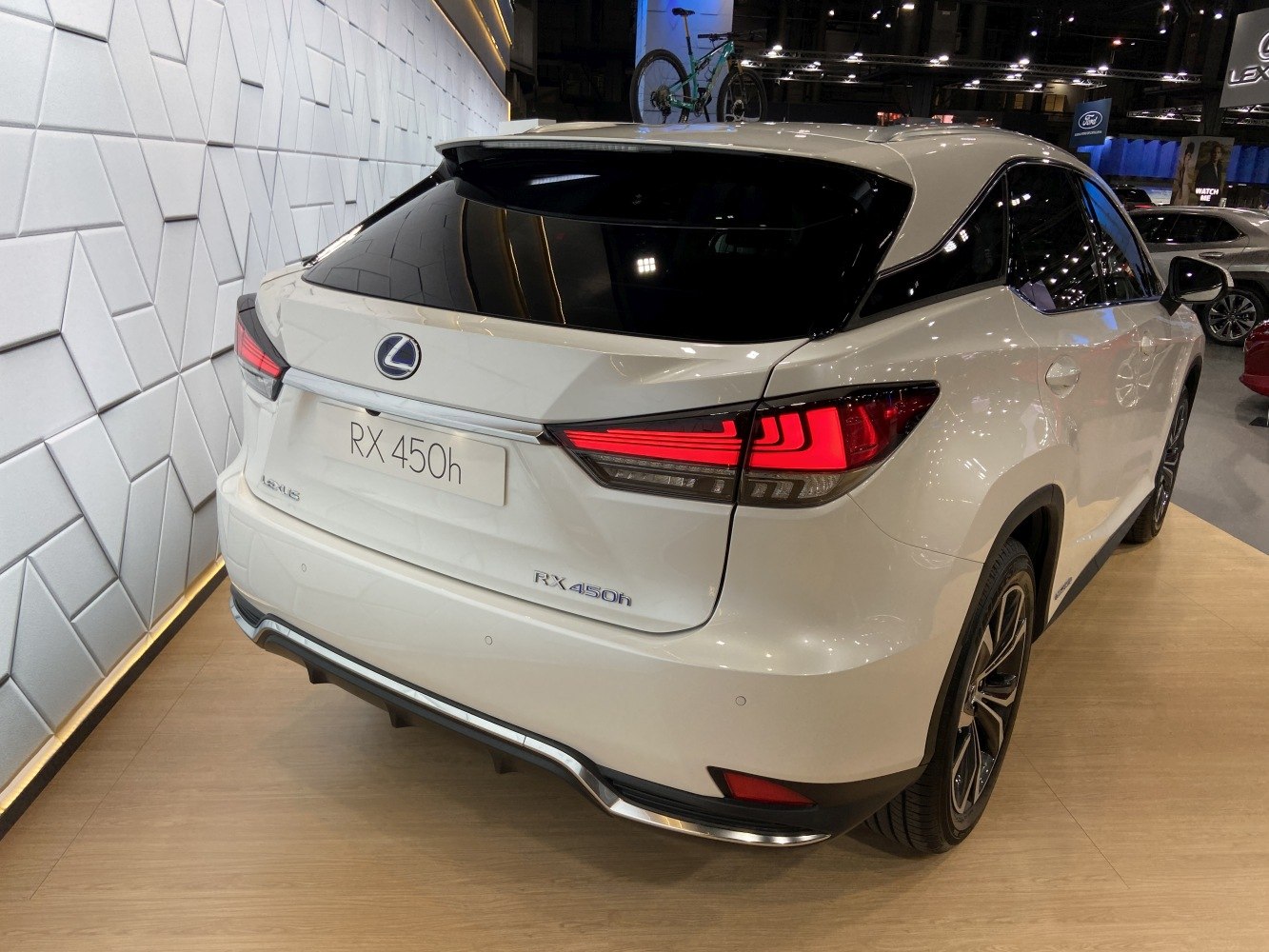 Modern rear design with sharp LED tail lights and sporty spoiler.
