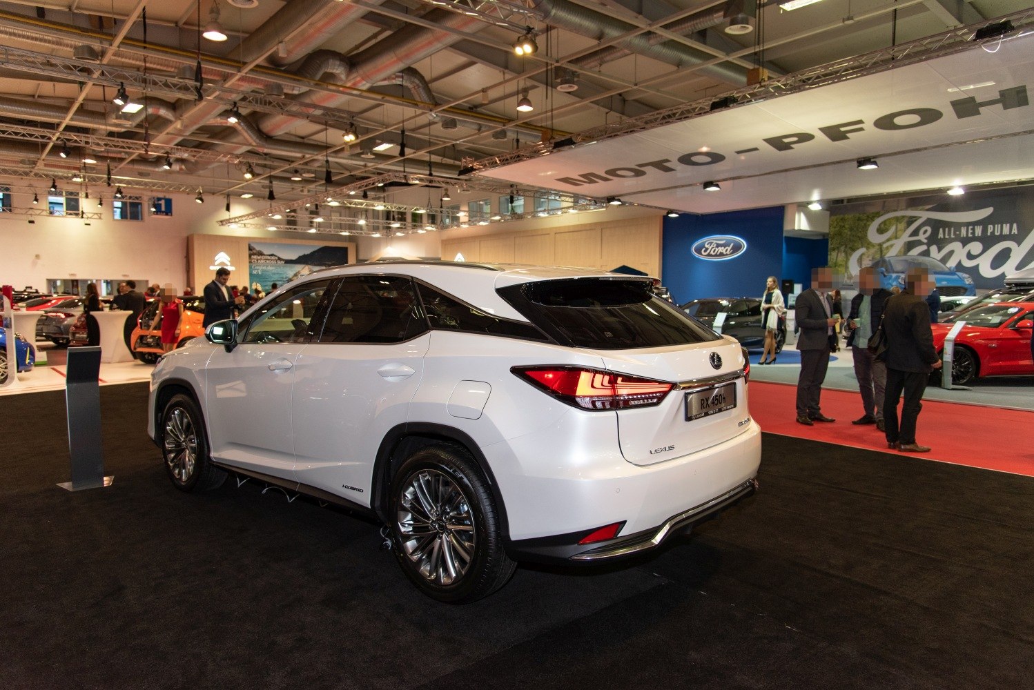 Rear and side view of modern luxury SUV with sharp taillights and sleek design