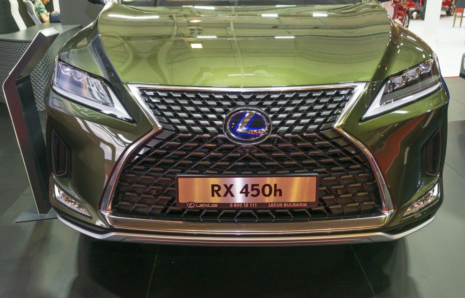 Close-up of front grille and headlights of hybrid SUV