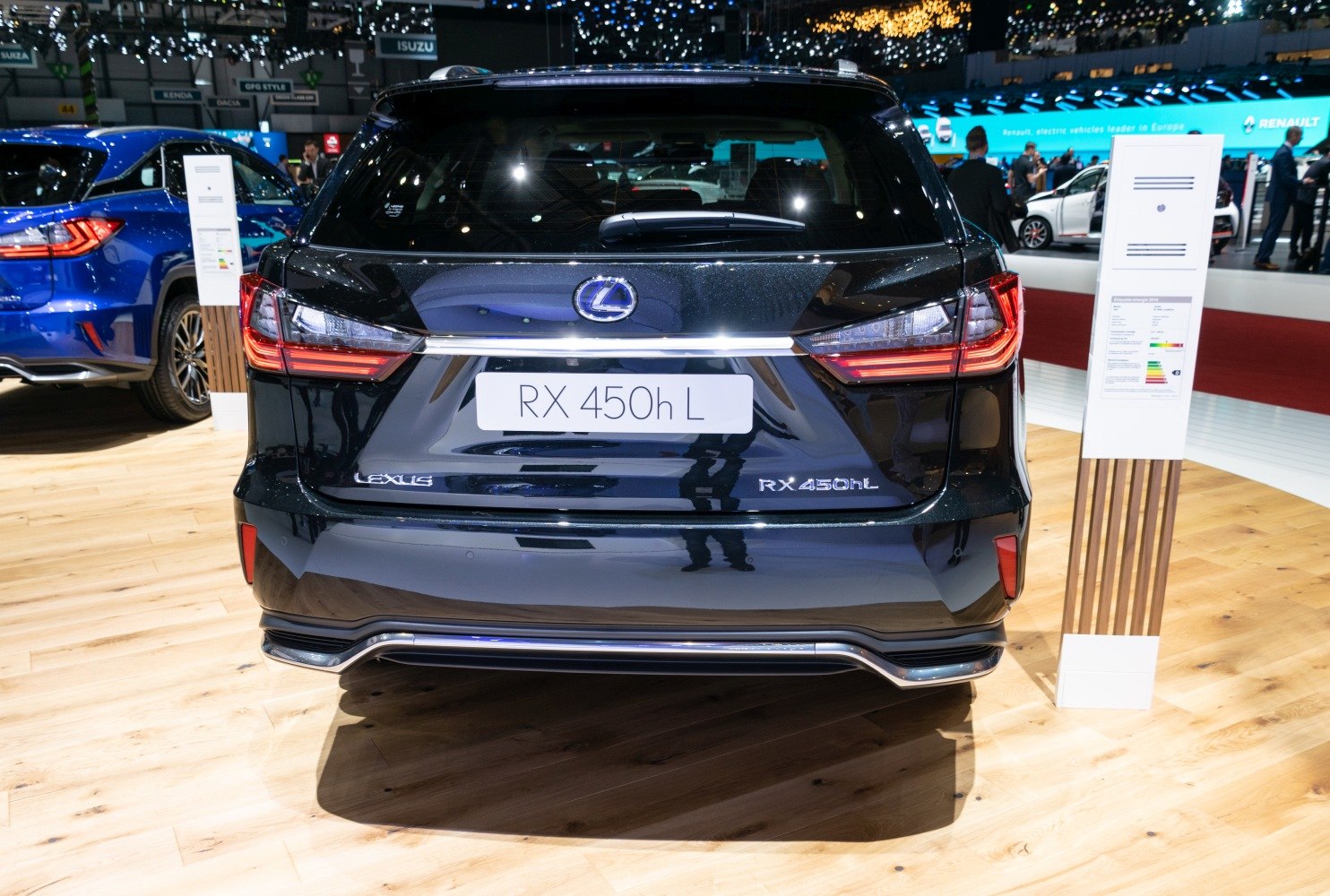 Rear view of a hybrid luxury SUV with distinctive taillights and chrome trim