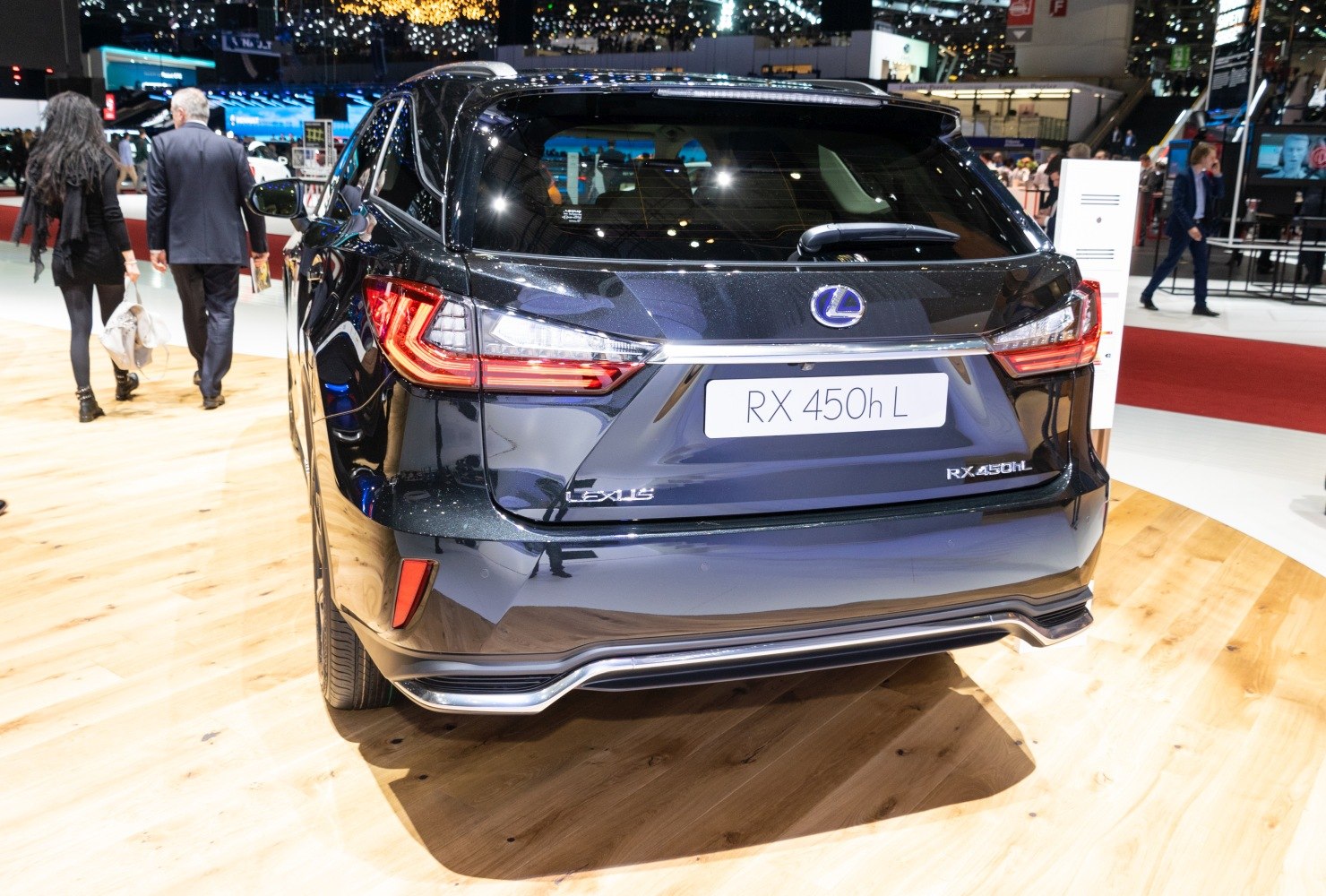 Rear view of vehicle with distinctive taillights and RX 450h L badge