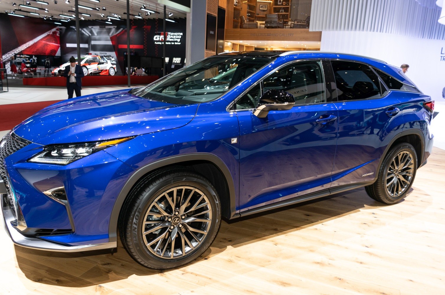 SUV front side view with sharp LED headlights and alloy wheels